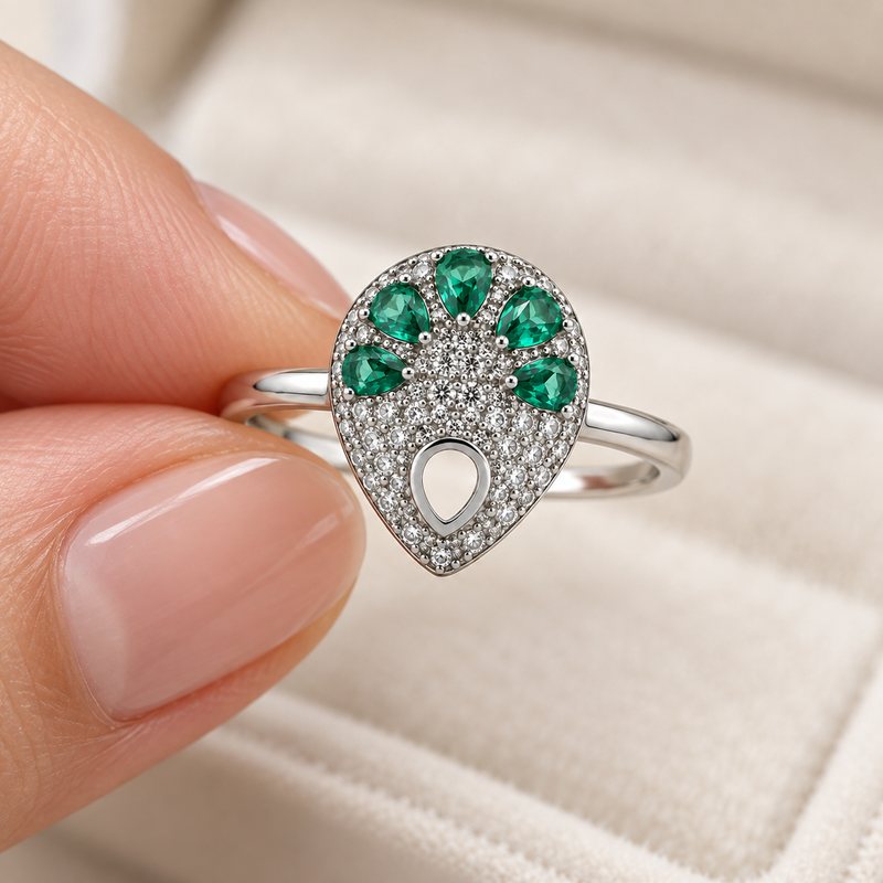 The ring held between the fingertips